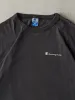 Vintage 90s Faded Black Champion Logo Tee (XL) sold by Rebalance Vintage