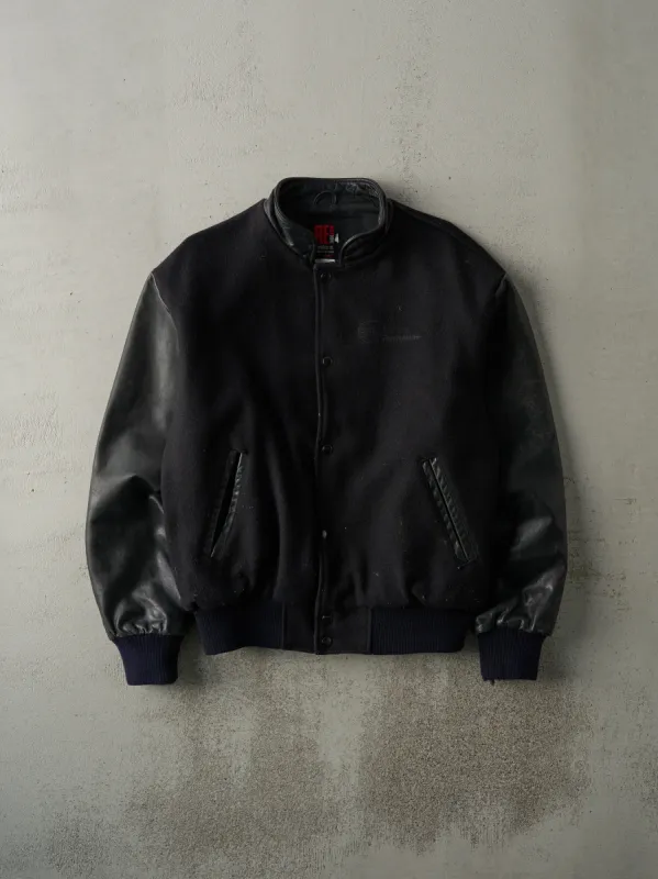 Vintage 90s Black Embroidered Logo Wool & Leather Varsity Jacket (M/L) sold by Rebalance Vintage