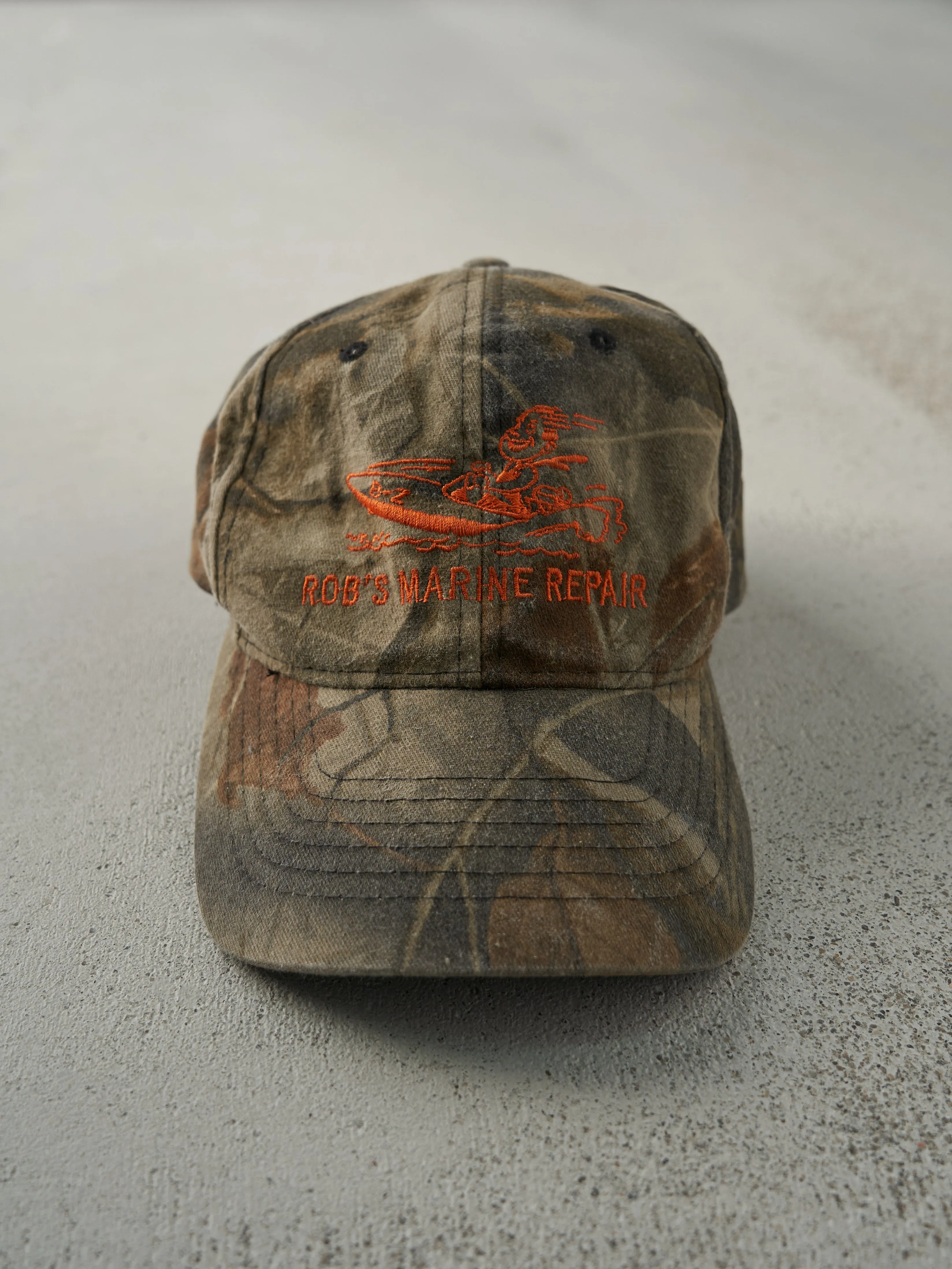 Vintage Y2K Camo Rob's Marine Repair Embroidered Realtree Camo Strap Back Hat sold by Rebalance Vintage