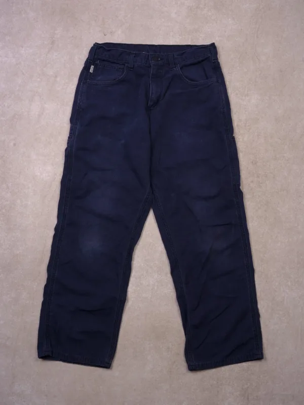 Vintage 90s Dark Blue Carhartt Carpenter Pants (32x30) sold by Rebalance Vintage
