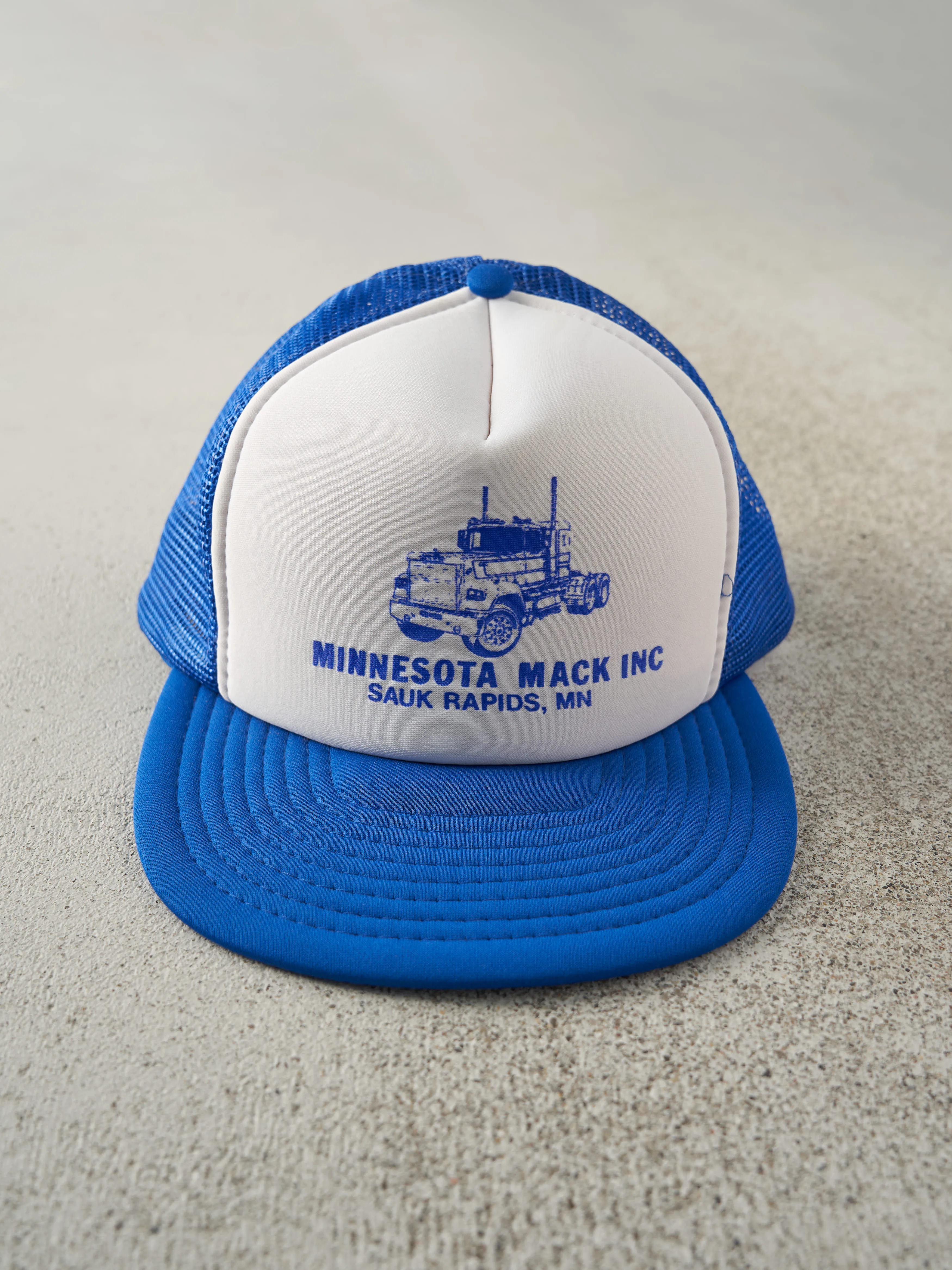 Vintage 80s Blue & White Minnesota Mack Foam Trucker Hat sold by Rebalance Vintage