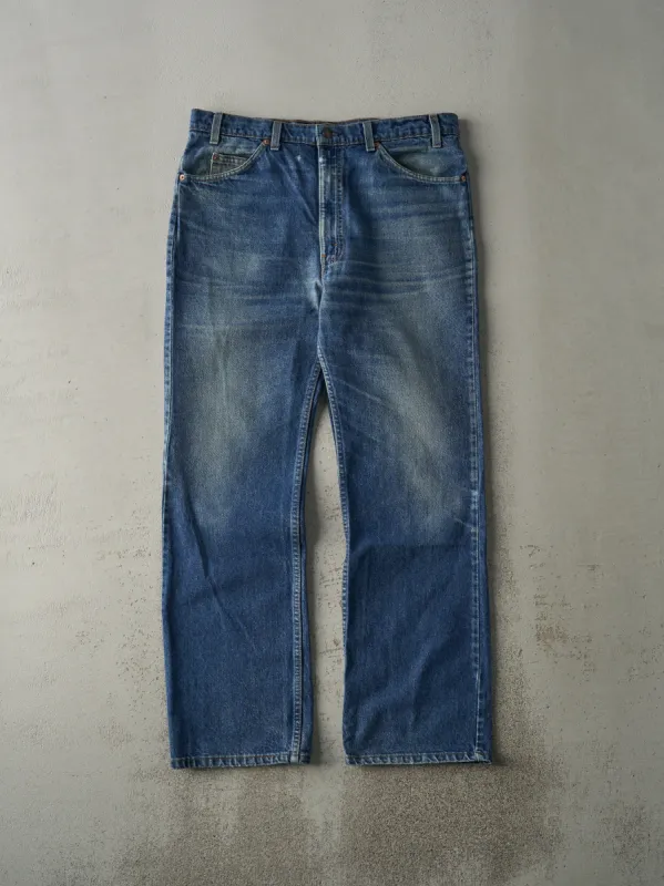 Vintage 80s Mid Wash Levi's 517 Orange Tab Jeans (36x31.5) sold by Rebalance Vintage