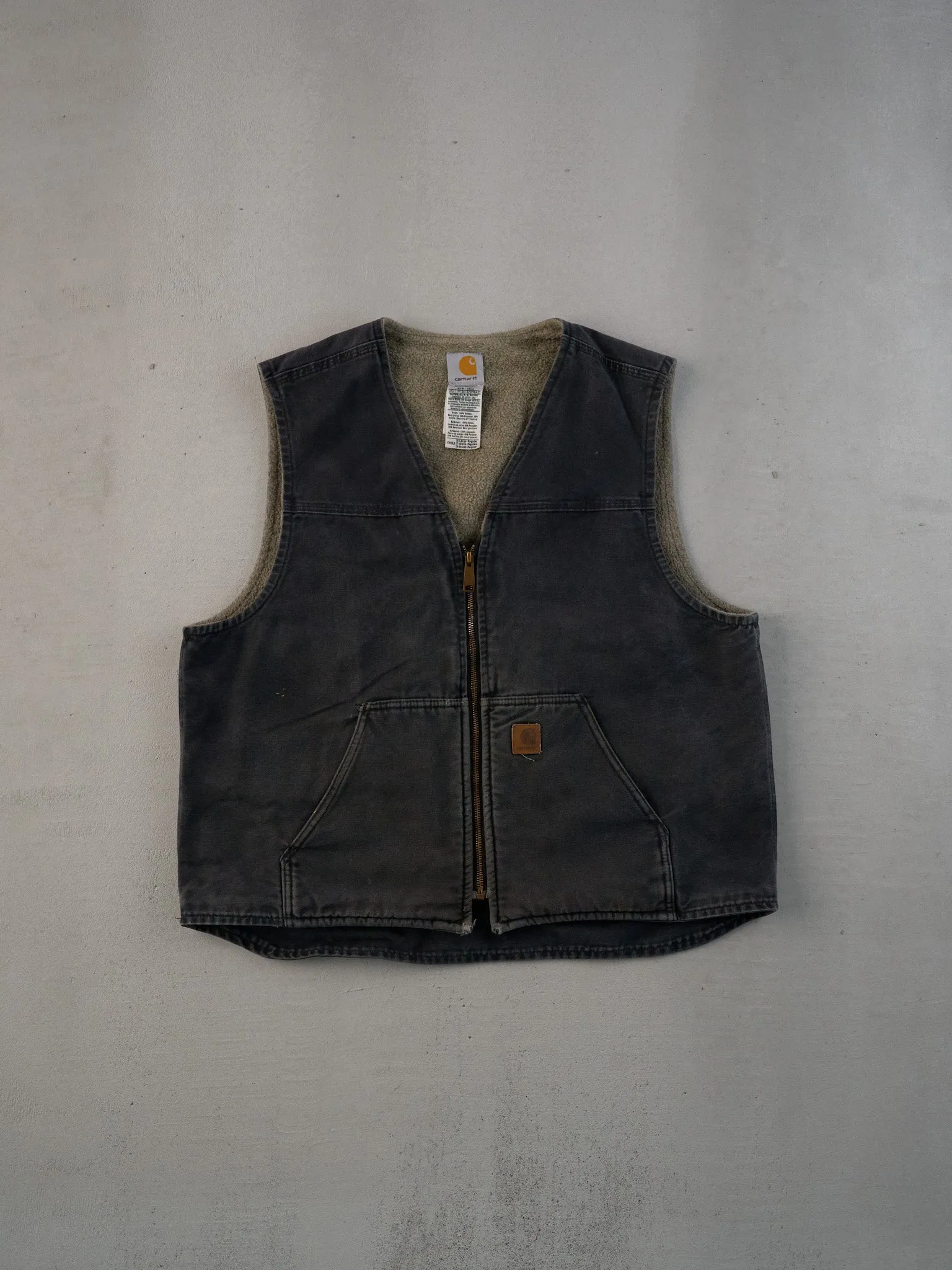 Vintage 90s Washed Black Carhartt Sherpa Lined Workwear Vest (L) sold by Rebalance Vintage