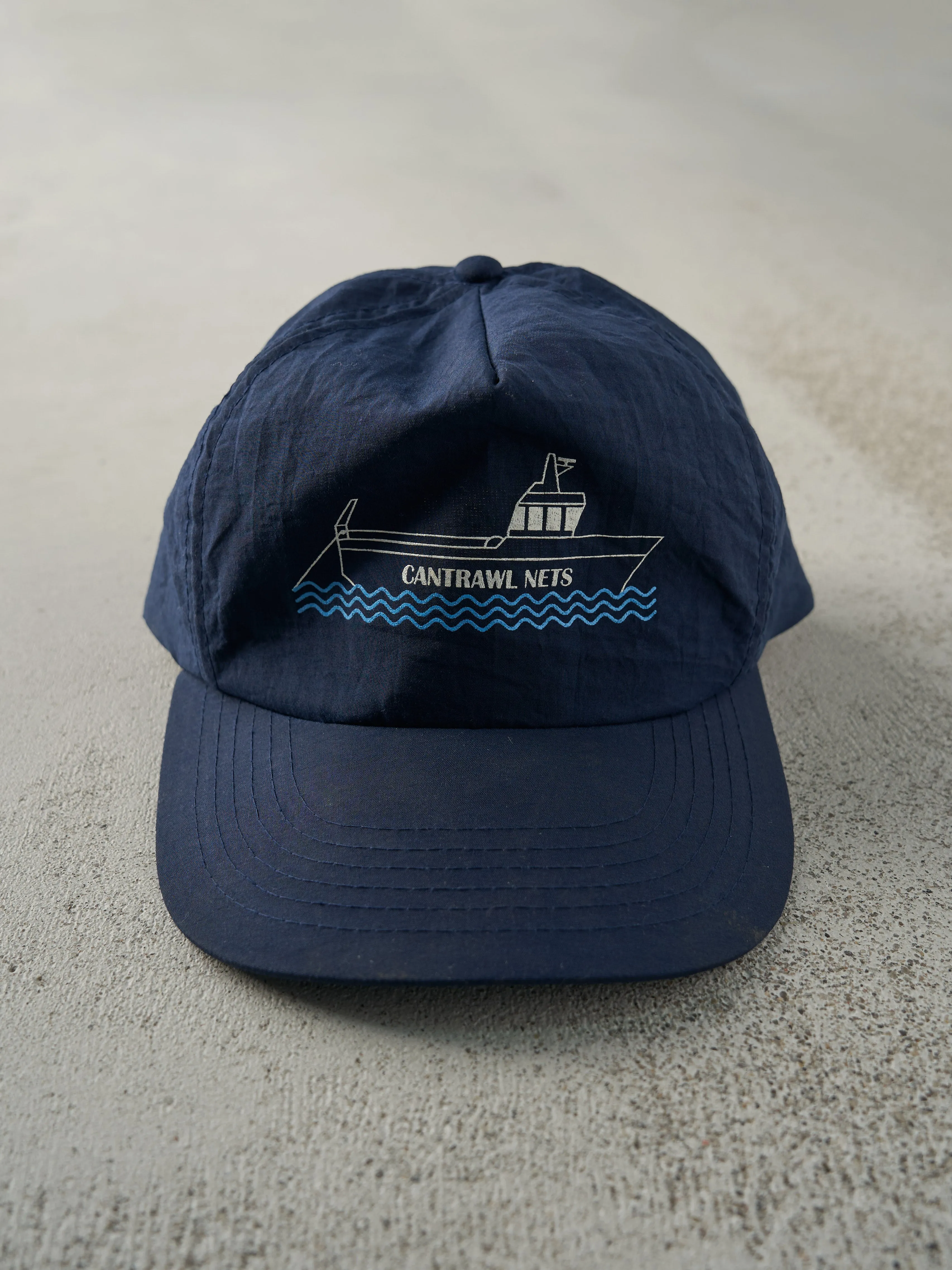 Vintage 90s Navy Blue Nylon Cantrawl Nets Snapback Hat sold by Rebalance Vintage