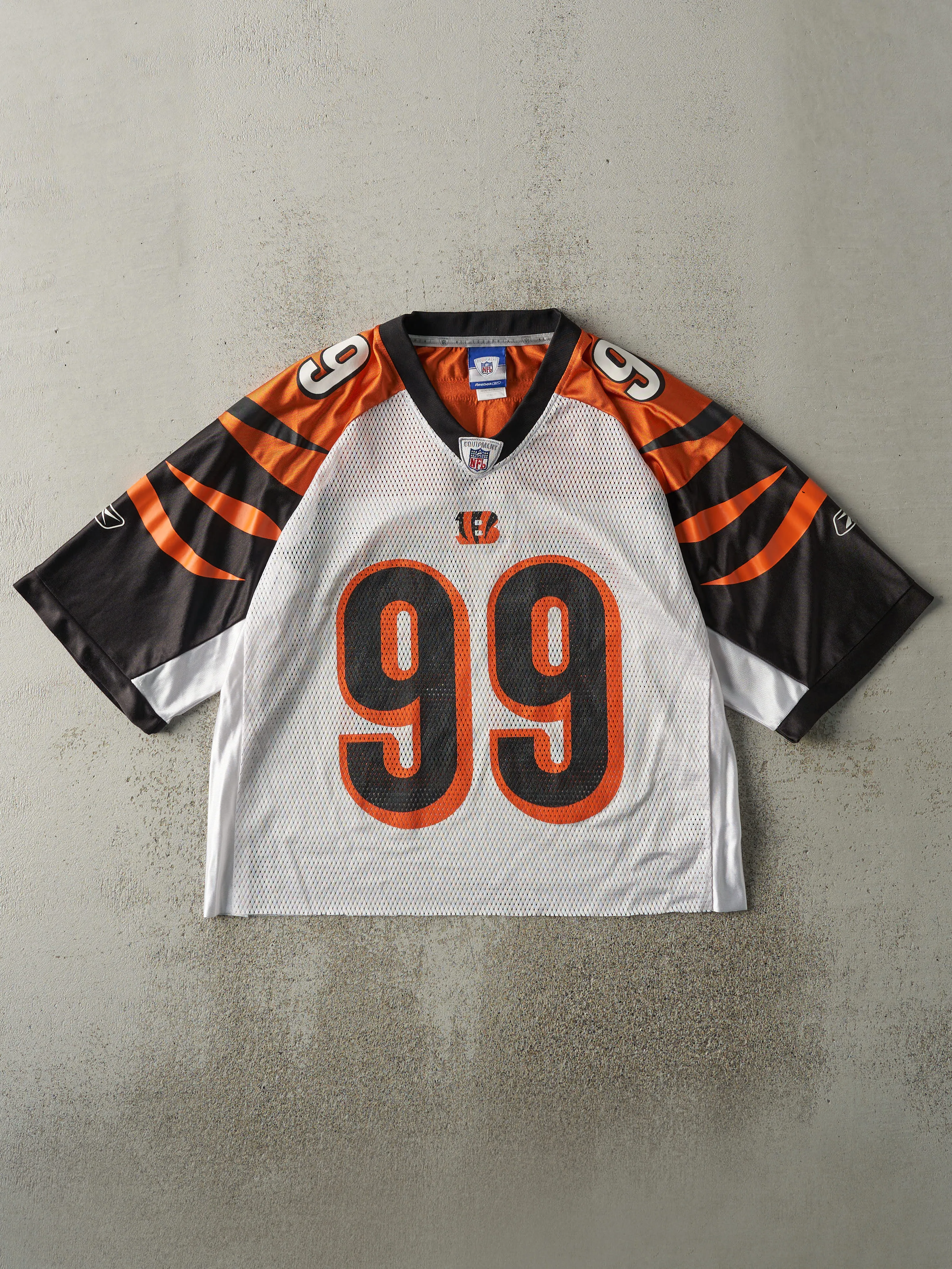 Vintage Y2K White, Black & Orange Cincinnati Bengals #99 Tank Johnson Cropped Football Jersey (M) sold by Rebalance Vintage