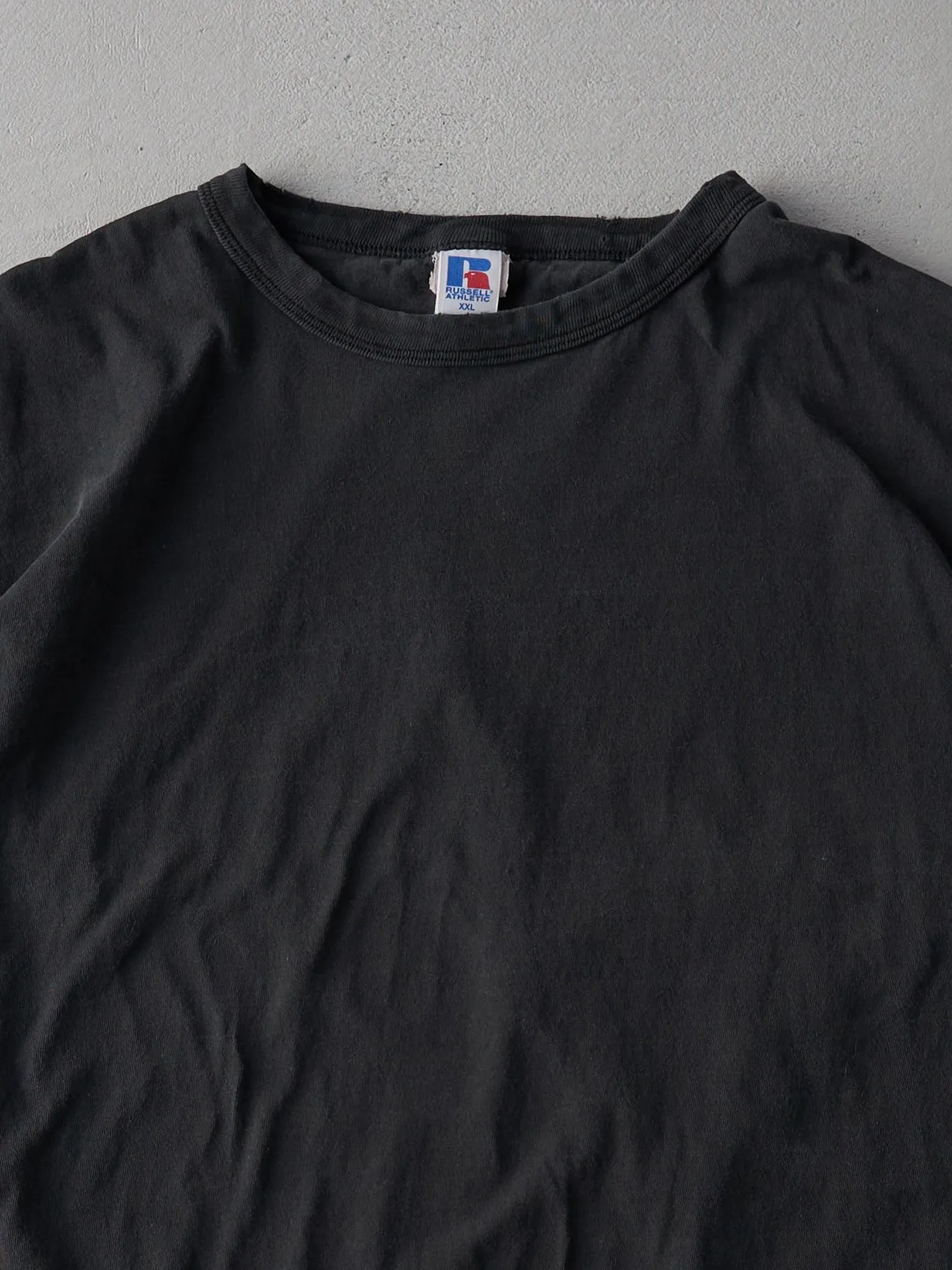 Vintage 90s Faded Black Russell Athletics Blank Tee (L/XL) sold by Rebalance Vintage product image thumbnail 2