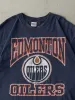 Vintage 90s Navy Blue Edmonton Oilers Tee (L) sold by Rebalance Vintage