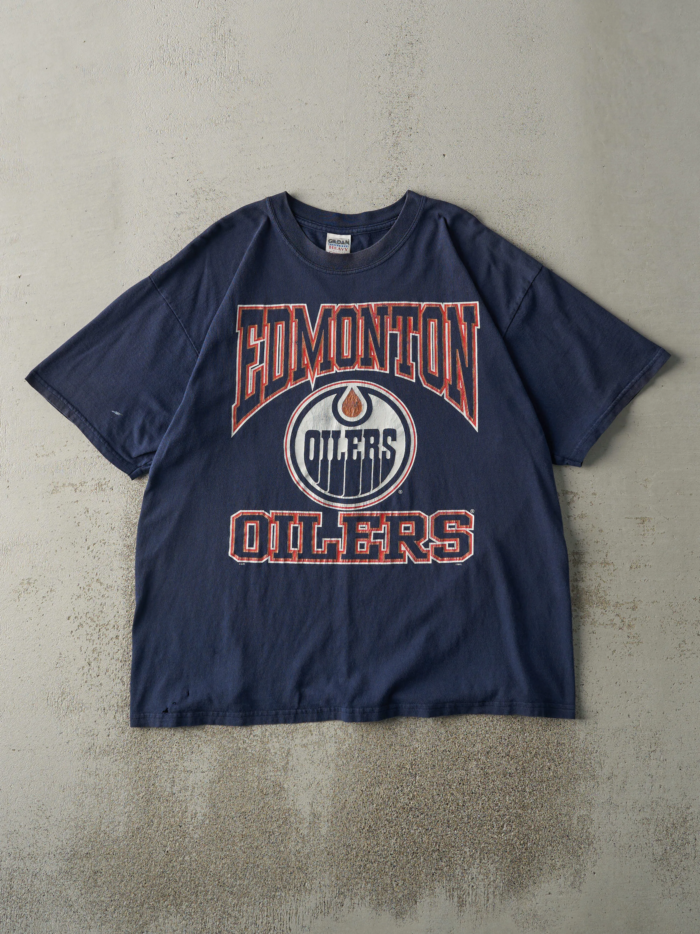 Vintage 90s Navy Blue Edmonton Oilers Tee (L) sold by Rebalance Vintage