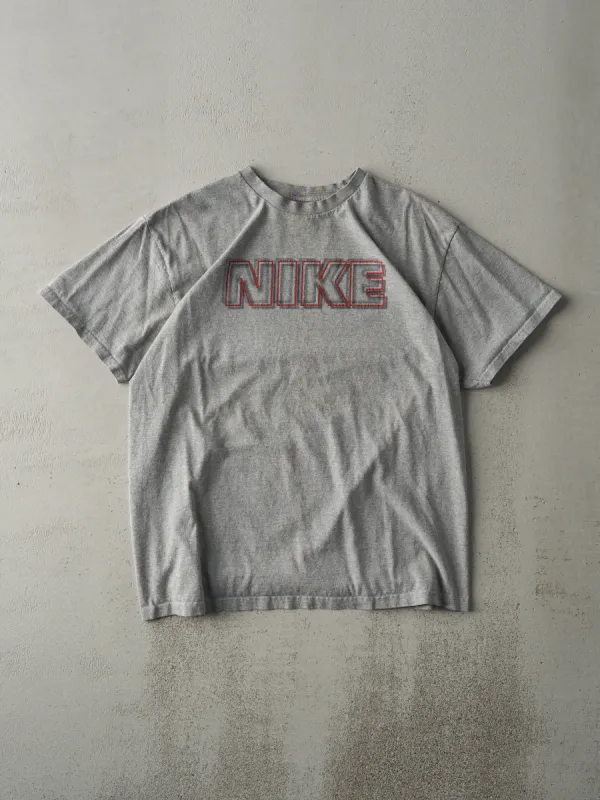Vintage Y2K Grey Nike Logo Tee (M) sold by Rebalance Vintage
