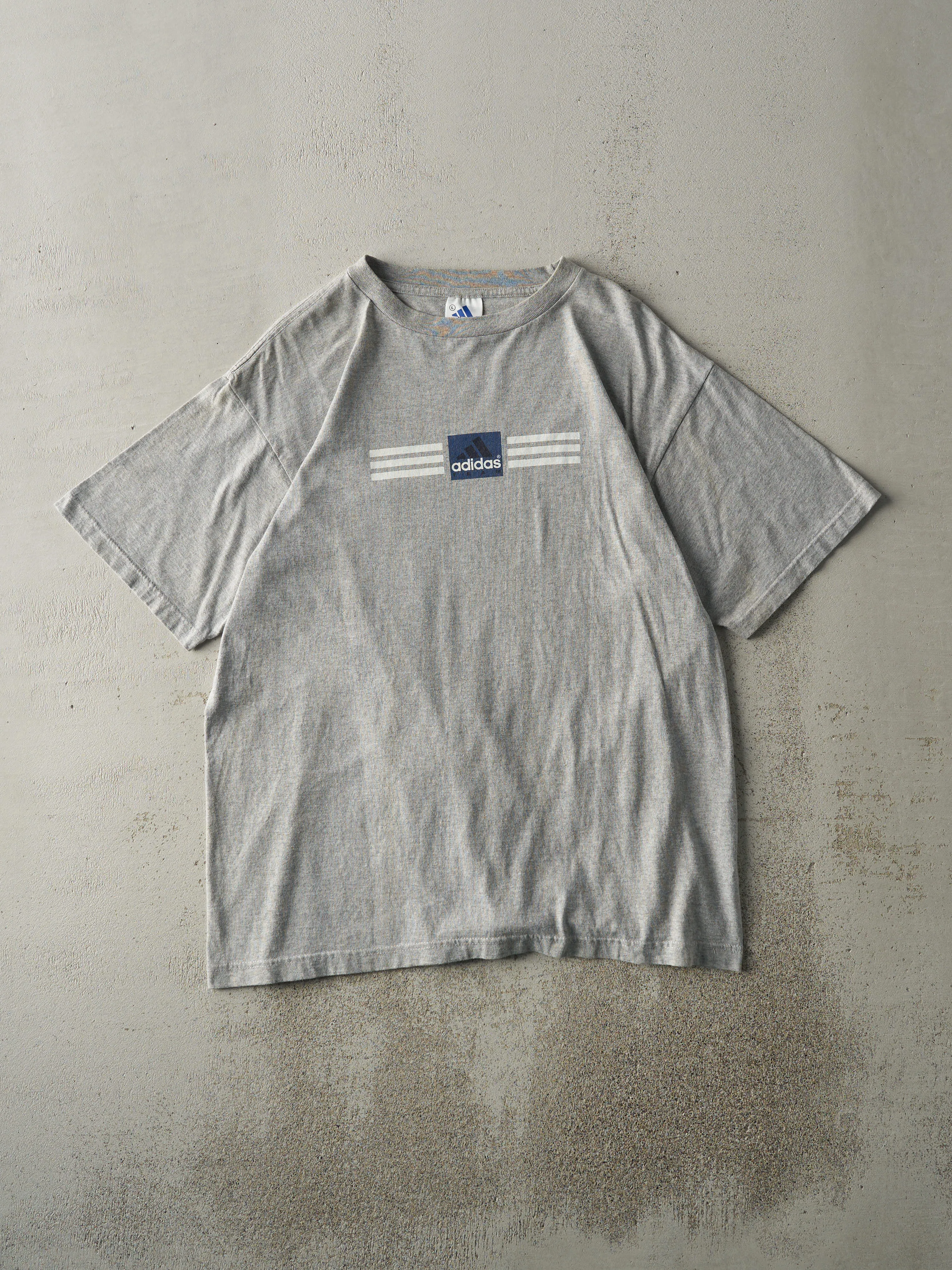 Vintage 90s Grey Adidas Team Logo Tee (M/L) sold by Rebalance Vintage