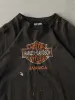 Vintage 90s Black Jamaica Harley Davidson Embroidered Bootleg Tee (L) sold by Rebalance Vintage