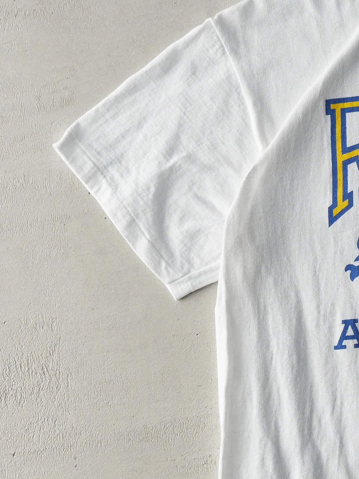 Vintage 90s White Roots Athletics Tee (S/M) sold by Rebalance Vintage product image thumbnail 3