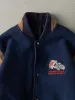 Vintage 80s Navy Blue Embroidered Wool Varsity Jacket (M/L) sold by Rebalance Vintage