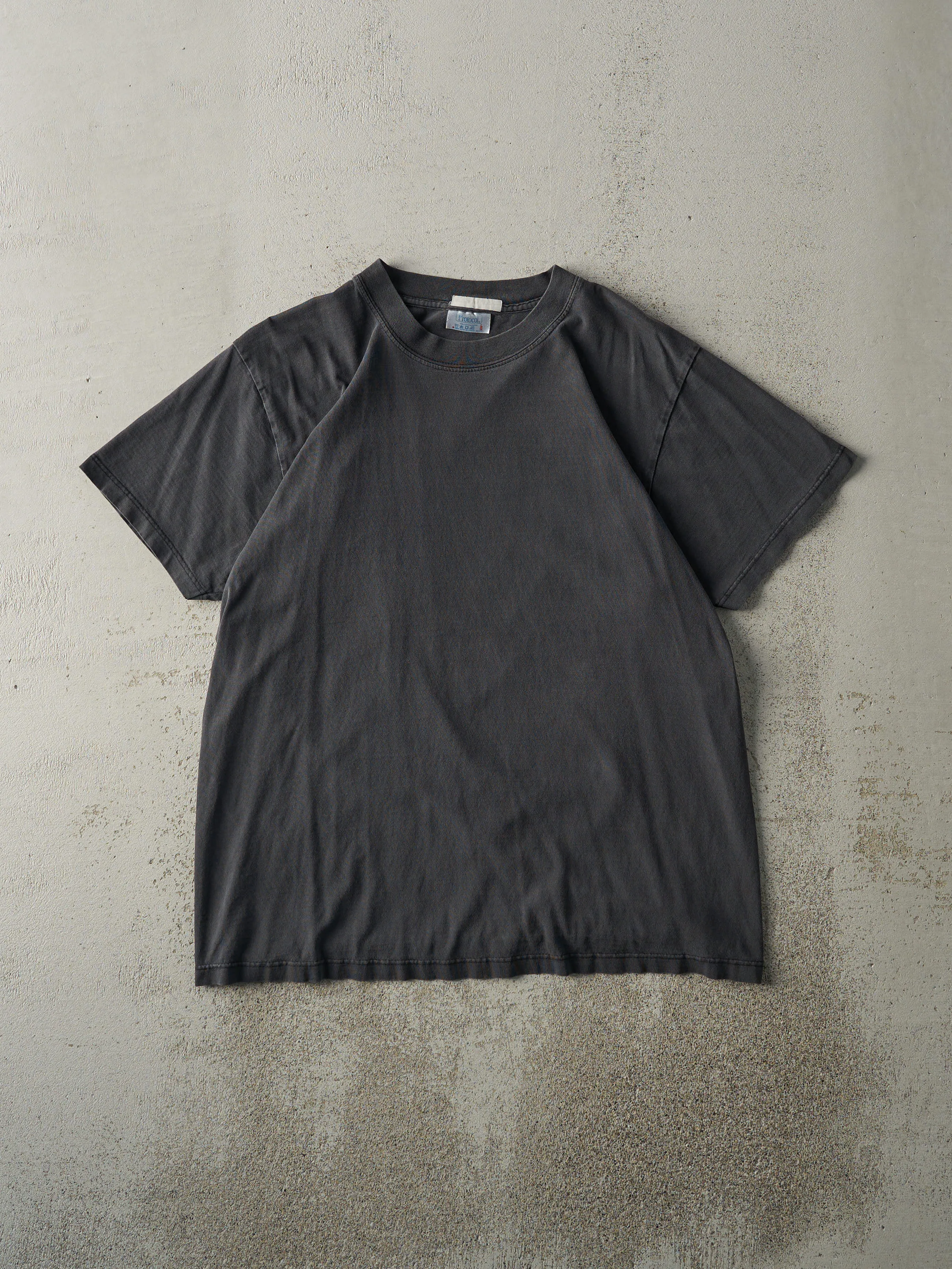 Vintage 90s Faded Black Blank Tee (M) sold by Rebalance Vintage