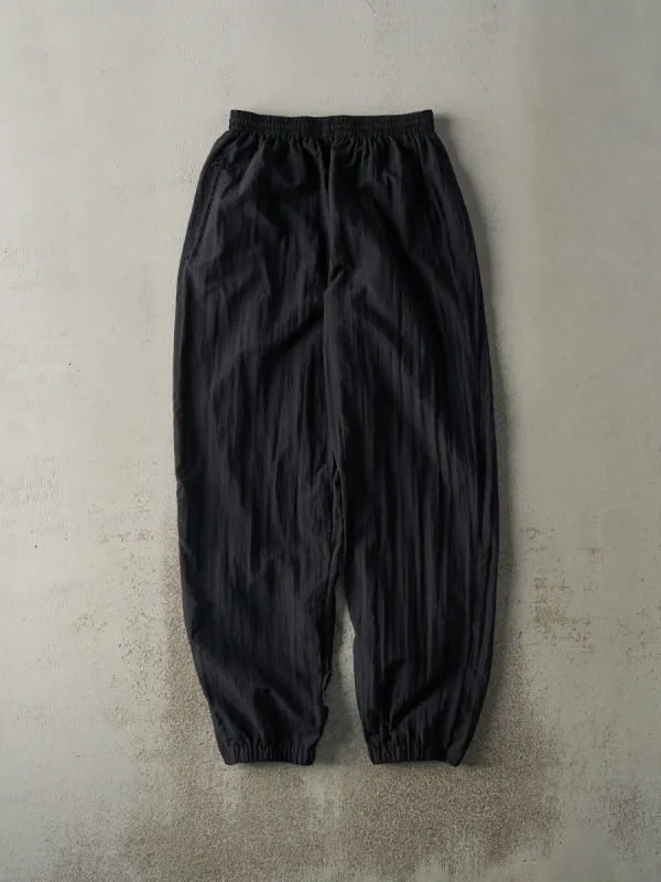 Vintage 90s Black Nylon Track Pants (27x30.5) sold by Rebalance Vintage
