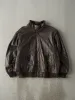 Vintage 80s Brown Boundary Waters Leather Bomber Jacket (L) sold by Rebalance Vintage