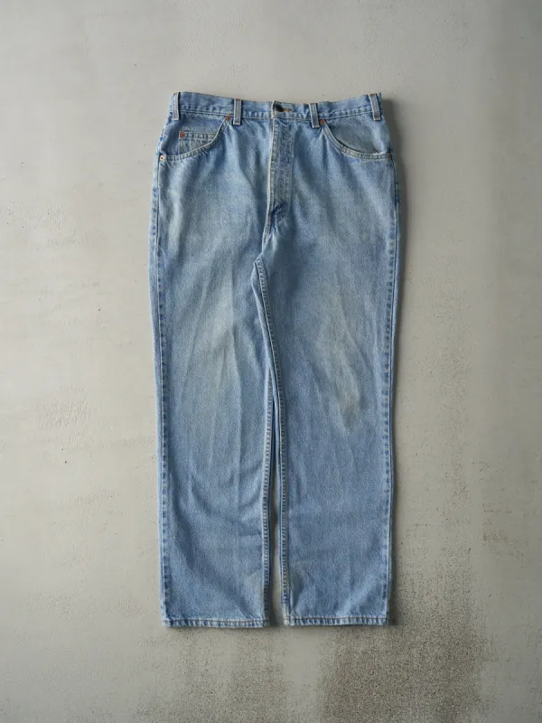Vintage 80s Light Wash Orange Tab Levi's Jeans (34x29) sold by Rebalance Vintage