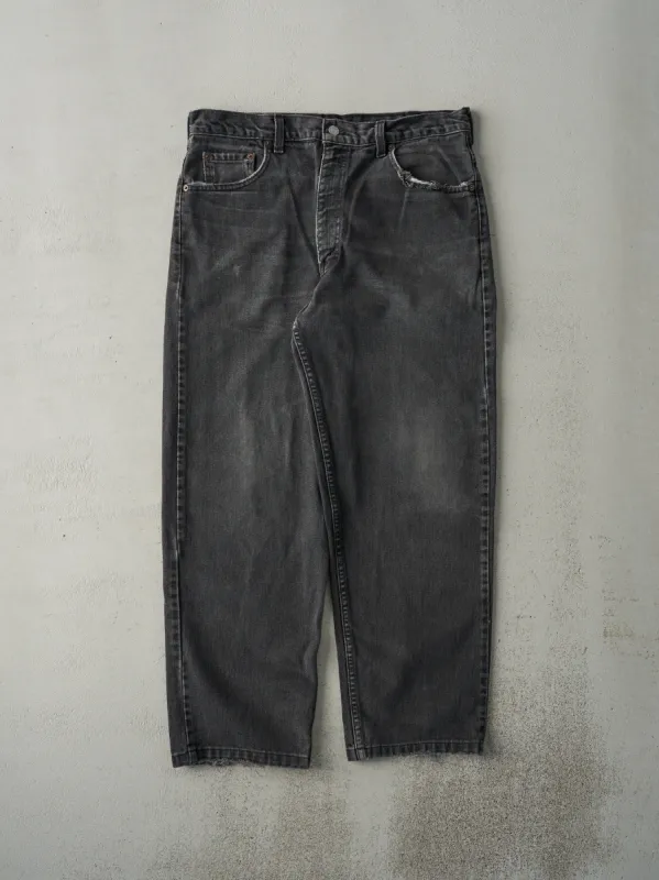 Vintage 90s Faded Black Levi's 550 Denim Pants (35x28) sold by Rebalance Vintage