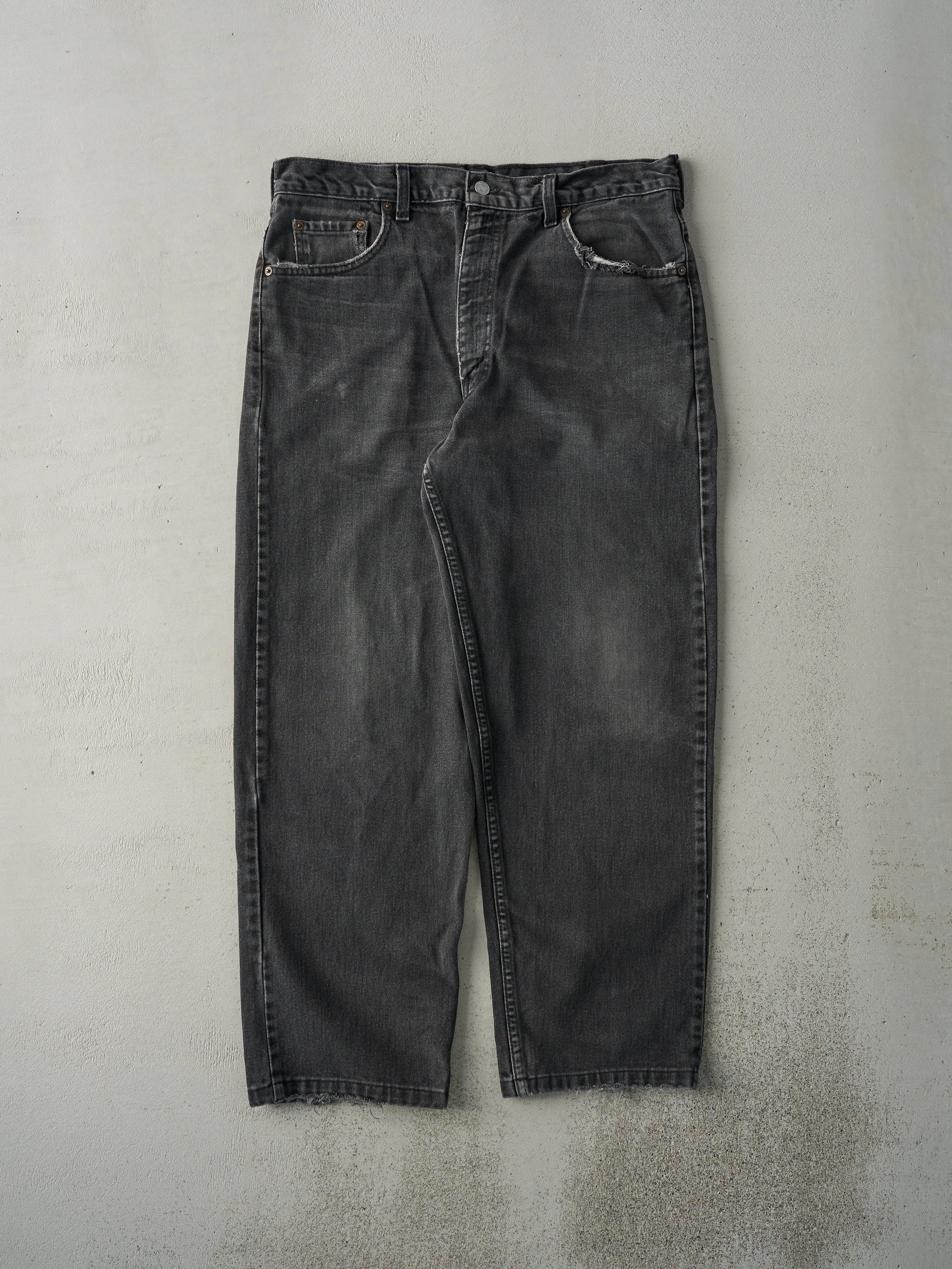 Vintage 90s Faded Black Levi's 550 Denim Pants (35x28) sold by Rebalance Vintage