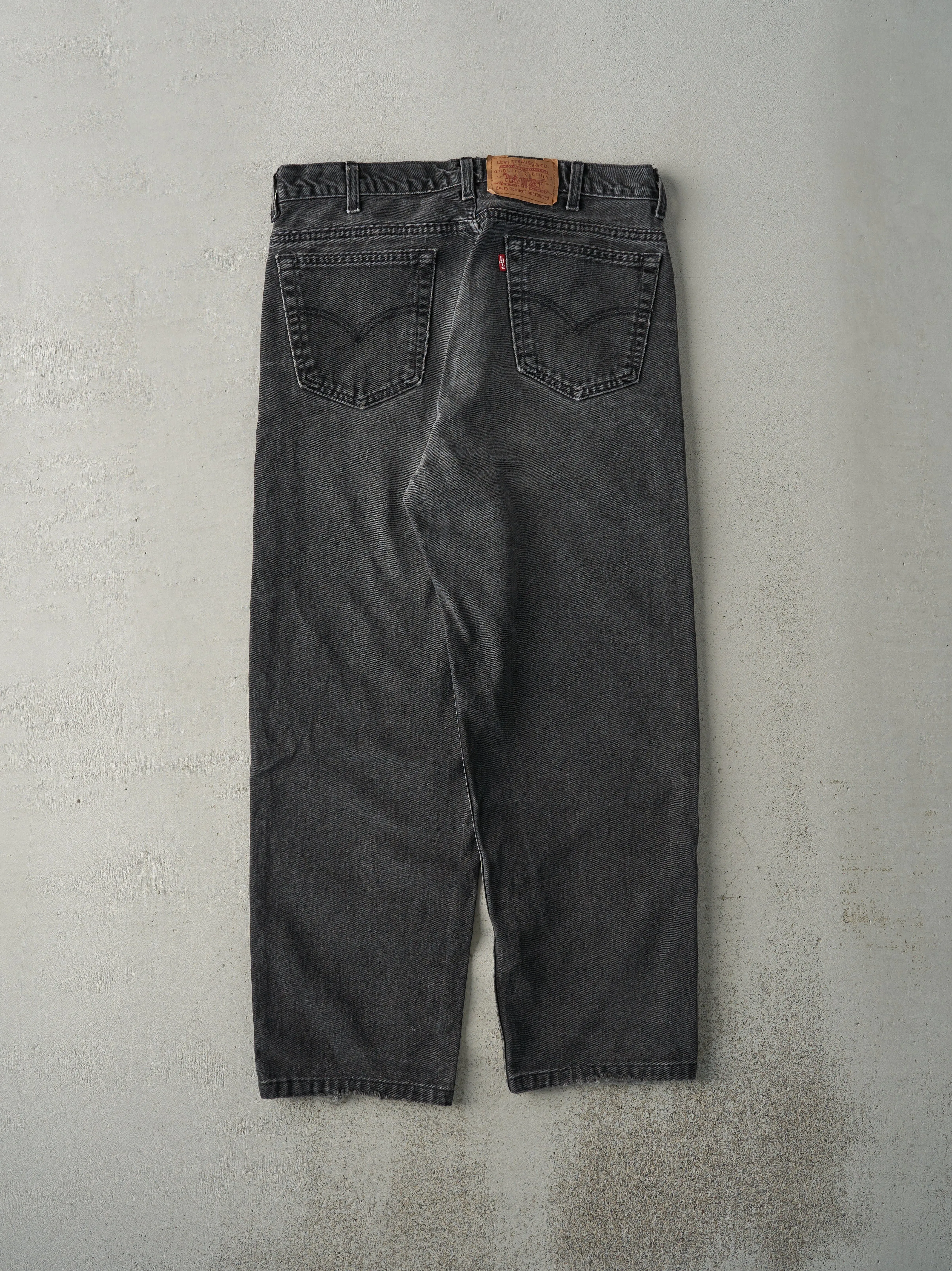 Vintage 90s Faded Black Levi's 550 Denim Pants (35x28) sold by Rebalance Vintage product image thumbnail 2