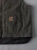 Vintage 90s Faded Green Carhartt Vest (XXL) sold by Rebalance Vintage