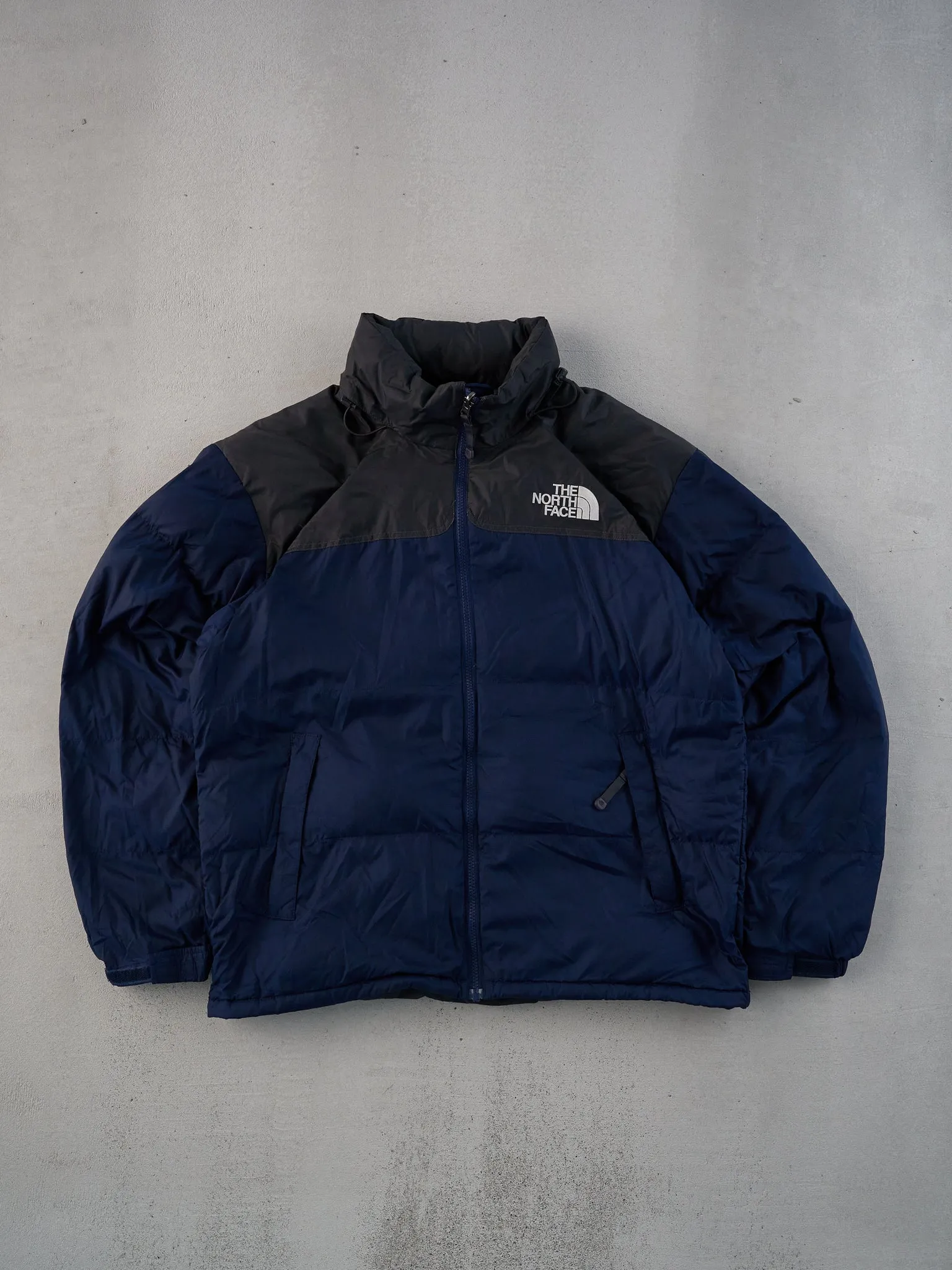 Vintage 90s Navy Blue and Black Northface Nuptse Winter Jacket (L) sold by Rebalance Vintage