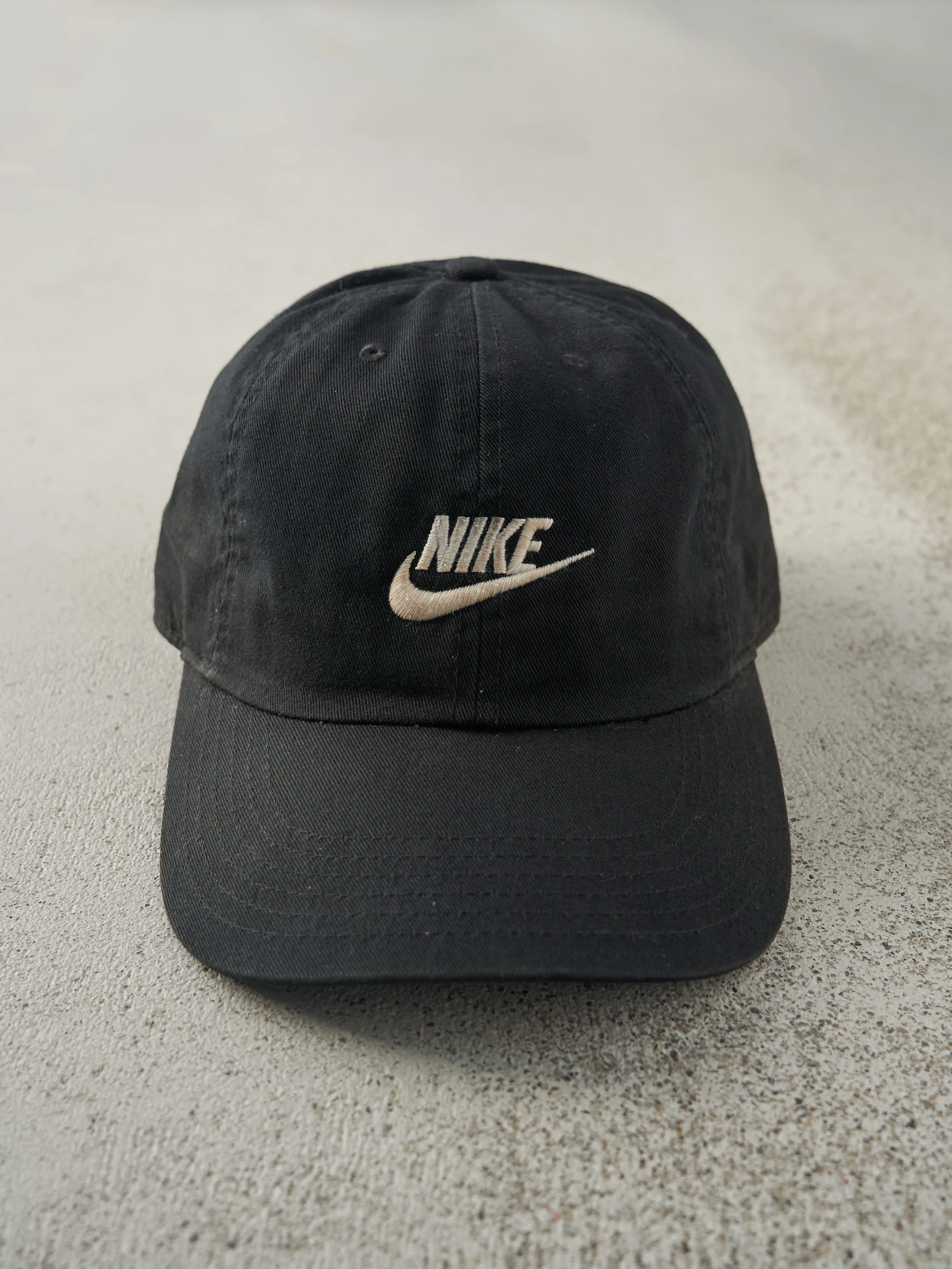 Vintage Y2K Black Embroidered Nike Strap Back Hat sold by Rebalance Vintage
