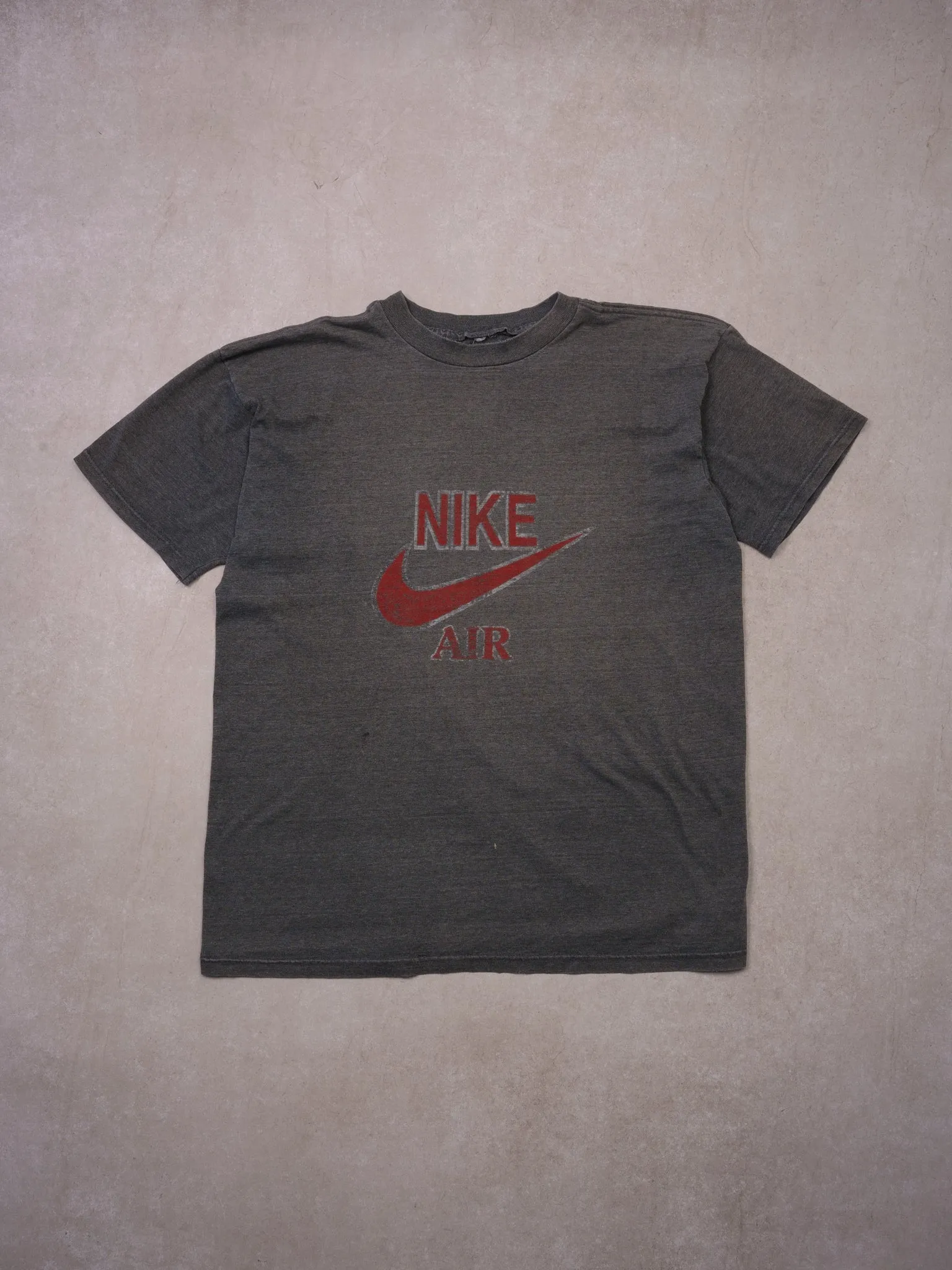 Vintage 80s Dark Grey Nike Air Bootleg Graphic Tee (M) sold by Rebalance Vintage