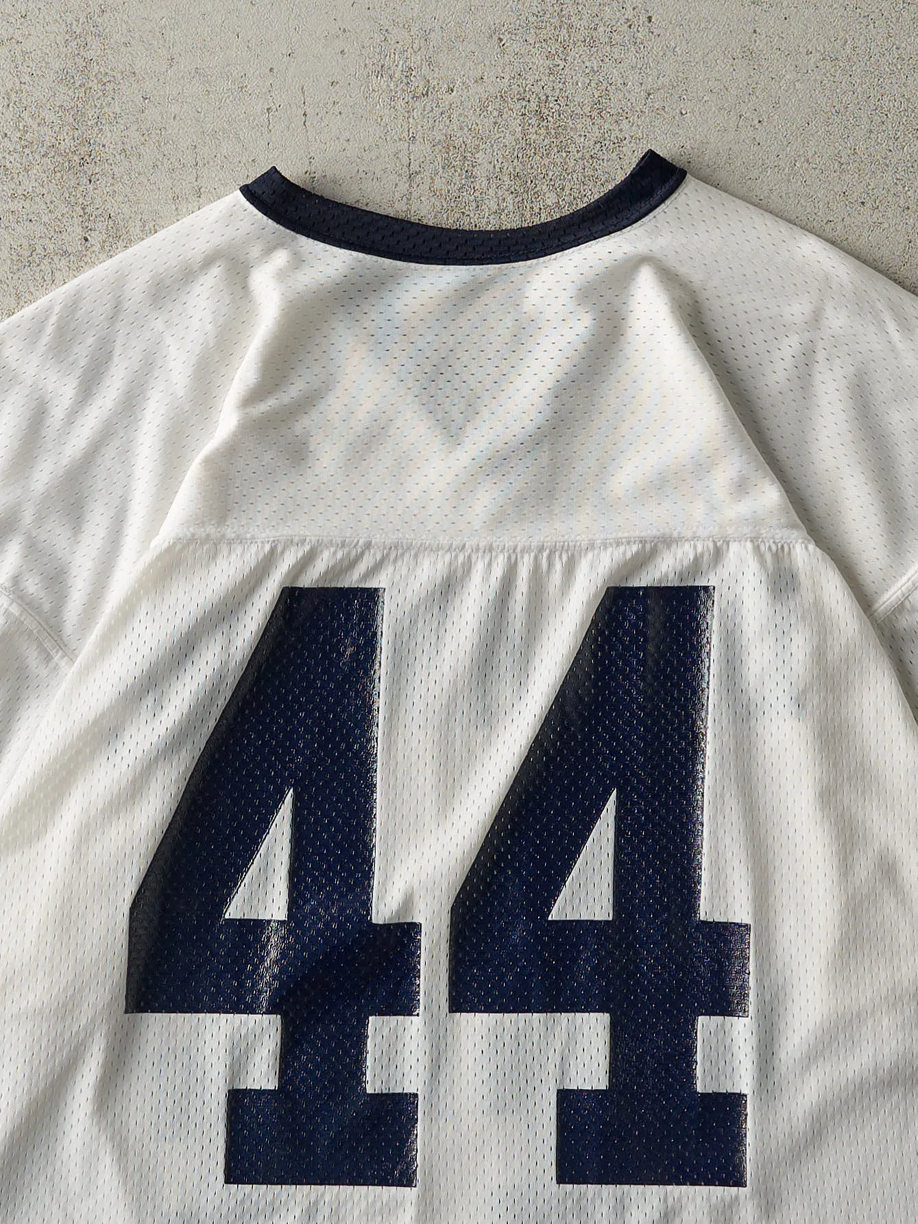 Vintage 90s White & Navy Delaware Cropped Jersey (M) sold by Rebalance Vintage product image thumbnail 5