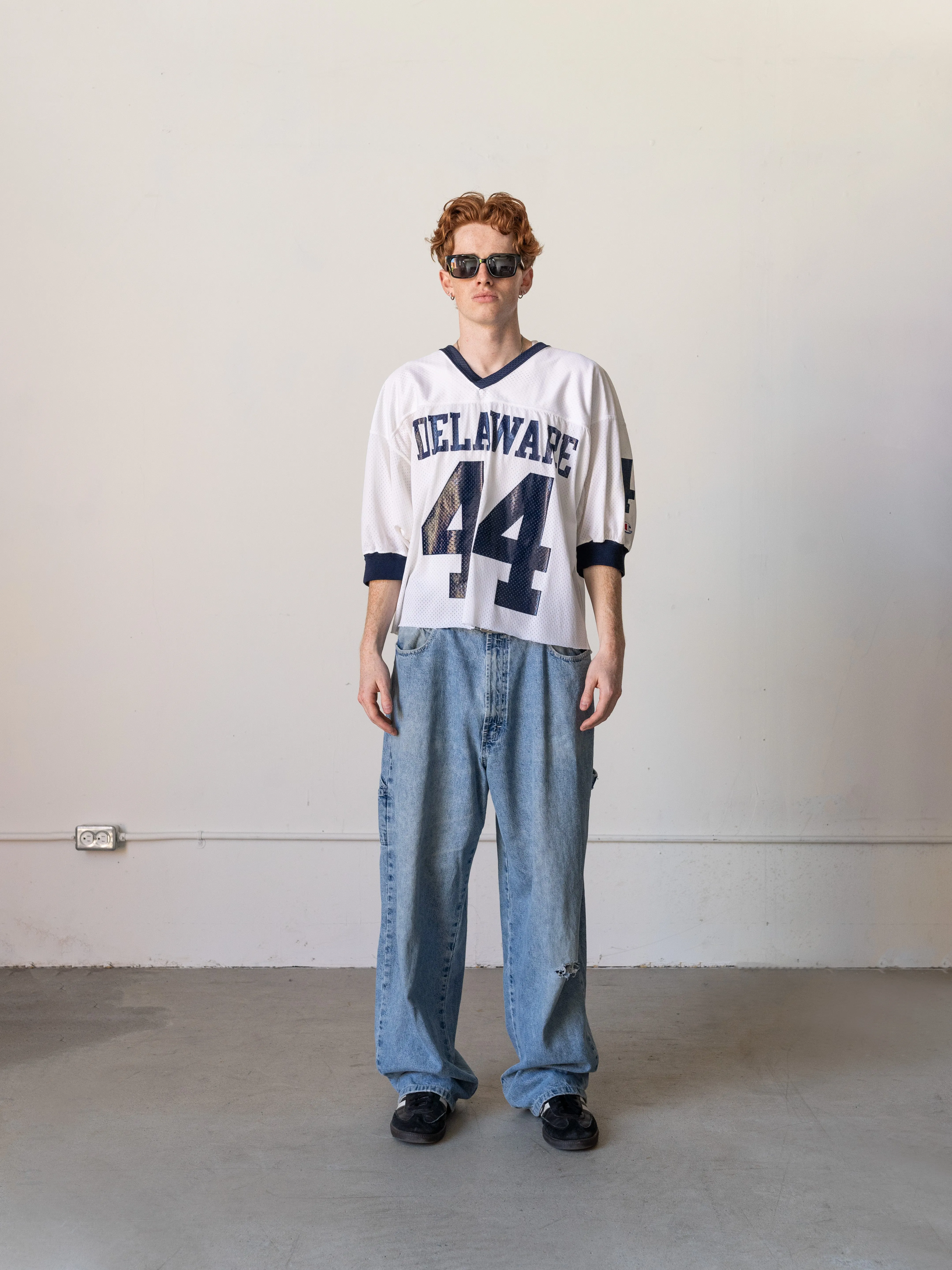 Vintage 90s White & Navy Delaware Cropped Jersey (M) sold by Rebalance Vintage product image thumbnail 2