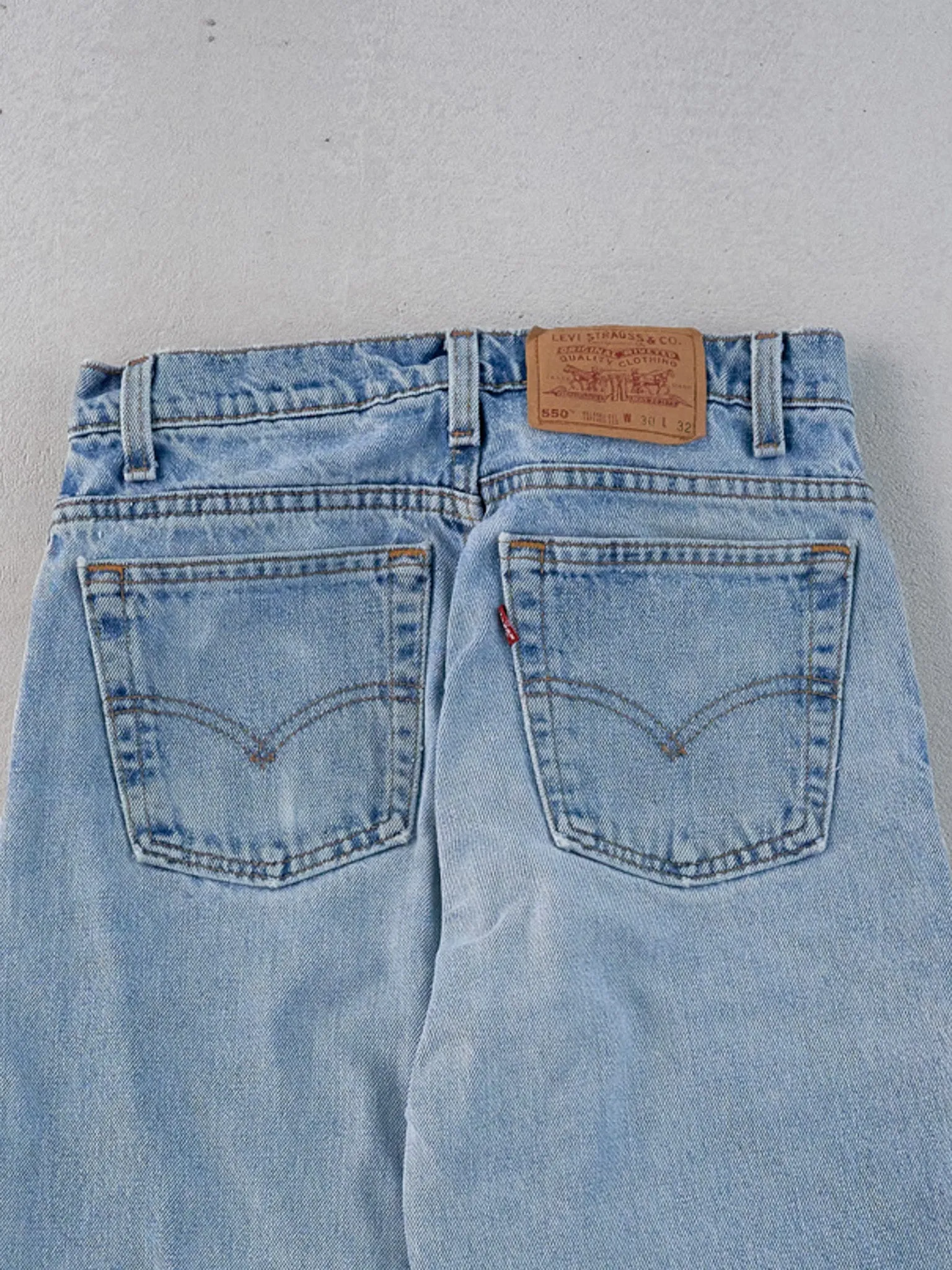 Vintage 90s Light Blue Levi's 550 Denim Jeans (28x30) sold by Rebalance Vintage product image thumbnail 4