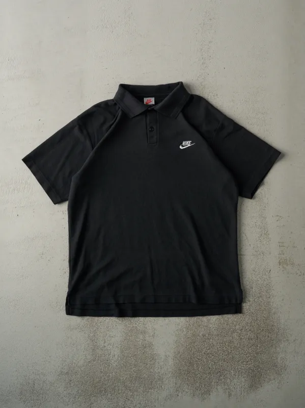 Vintage 90s Black Nike Golf Bootleg Collared Tee (M) sold by Rebalance Vintage