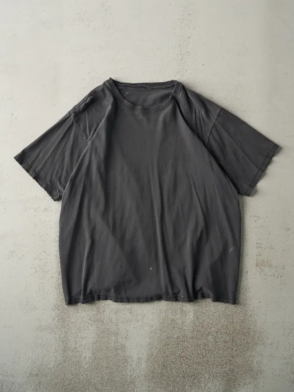 Vintage 90s Faded Black Blank Tee (M/L) sold by Rebalance Vintage