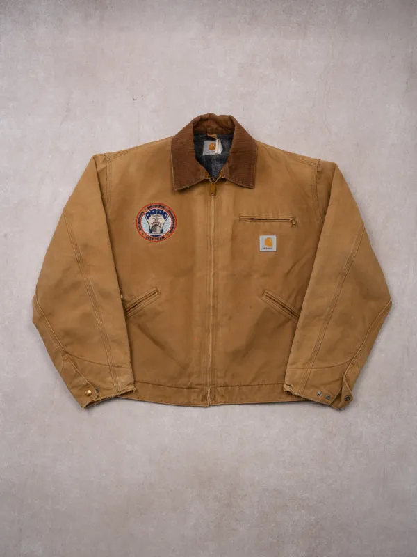 Vintage Camel Clark Construction Carhartt lined Detroit Jacket (M) sold by Rebalance Vintage