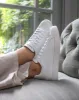 Olympus Low Top Sneakers - White Leather sold by SANS MATIN