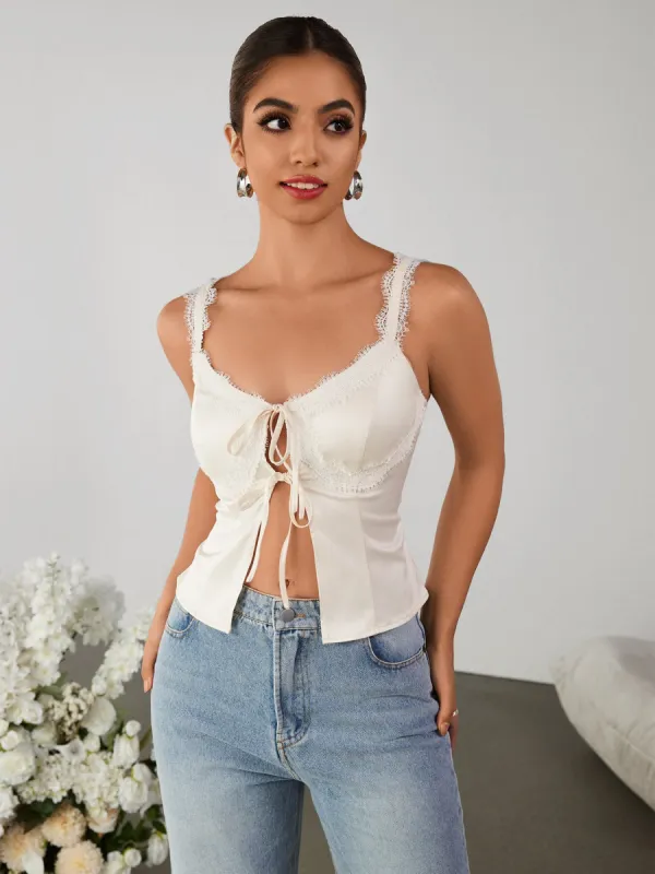Lace Trim Cut Out Tie Front Slit Hem Top sold by Parthea Fashion