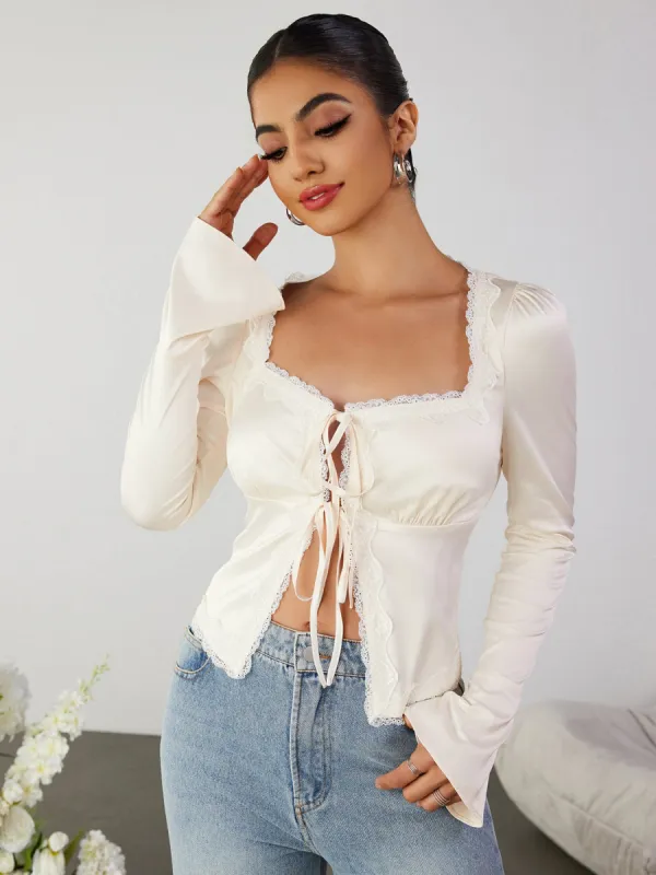 Cut Out Lace Trim Tie Front Top sold by Parthea Fashion