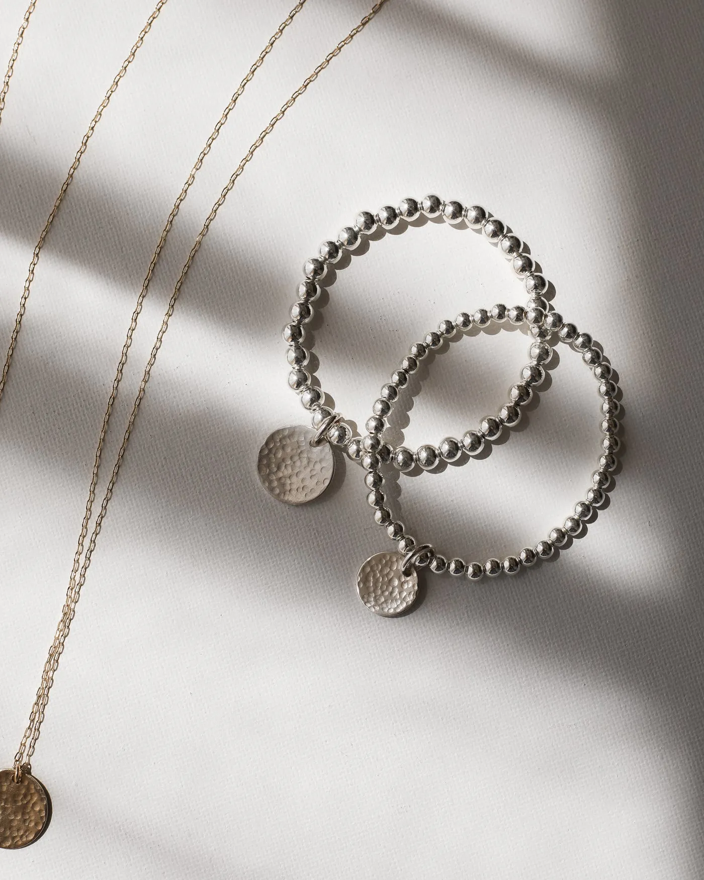 THE HAMMERED COIN BEADED BRACELET - STERLING SILVER sold by Stylin by Aylin