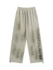Thesupermade Wasteland Distressed Embroidered Sweatpants sold by Thesupermade