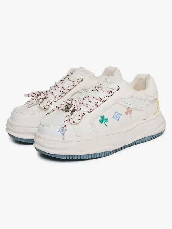 Vintage Frayed Denim Embroidered Floral Sneakers sold by Thesupermade