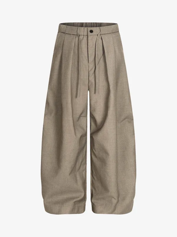 Pleated Drawstring Scimitar Track Pants sold by Thesupermade
