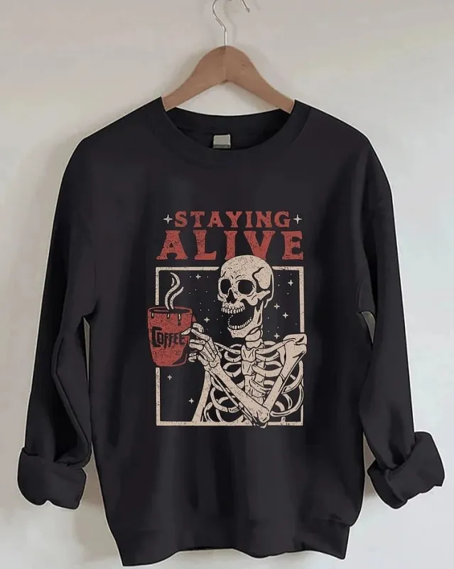 Women's Big & Tall Staying Alive Coffee Sweatshirt sold by Biggmans