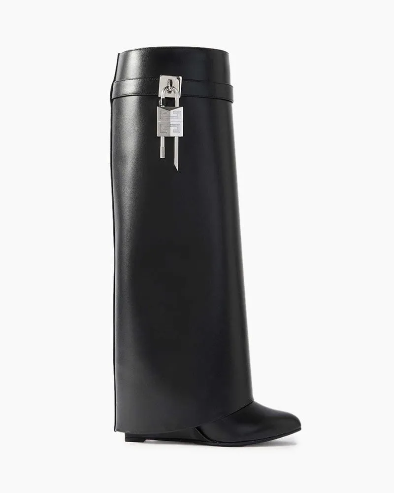 Shark Lock embellished glossed-leather knee boots sold by Larosa