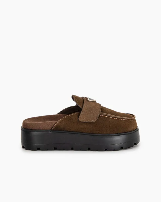 Suede flatform mules sold by Larosa