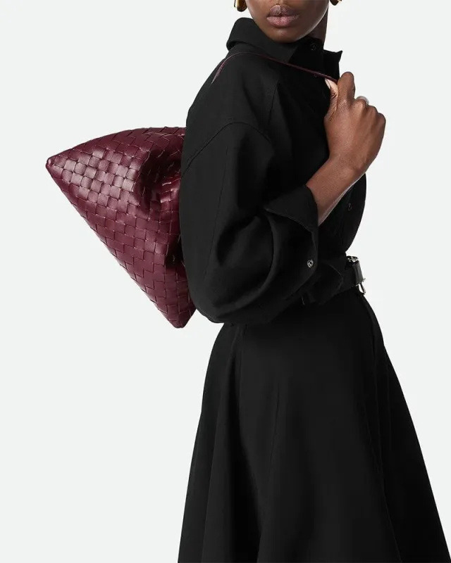 Woven Medium Dustbag Leather Clutch Bag sold by Larosa