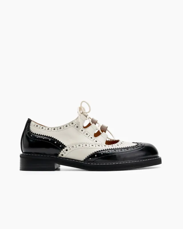 Lace-up Wingtip Perforated Leather Oxfords sold by Larosa