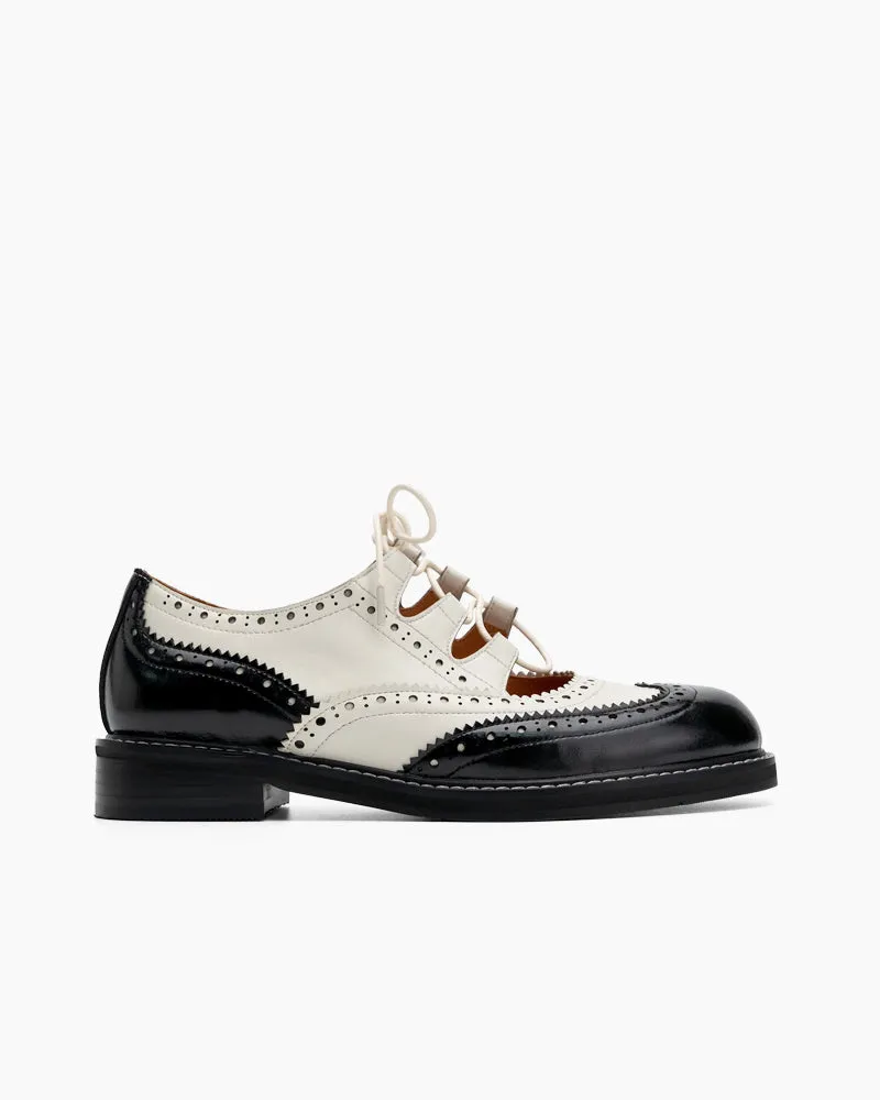 Lace-up Wingtip Perforated Leather Oxfords sold by Larosa