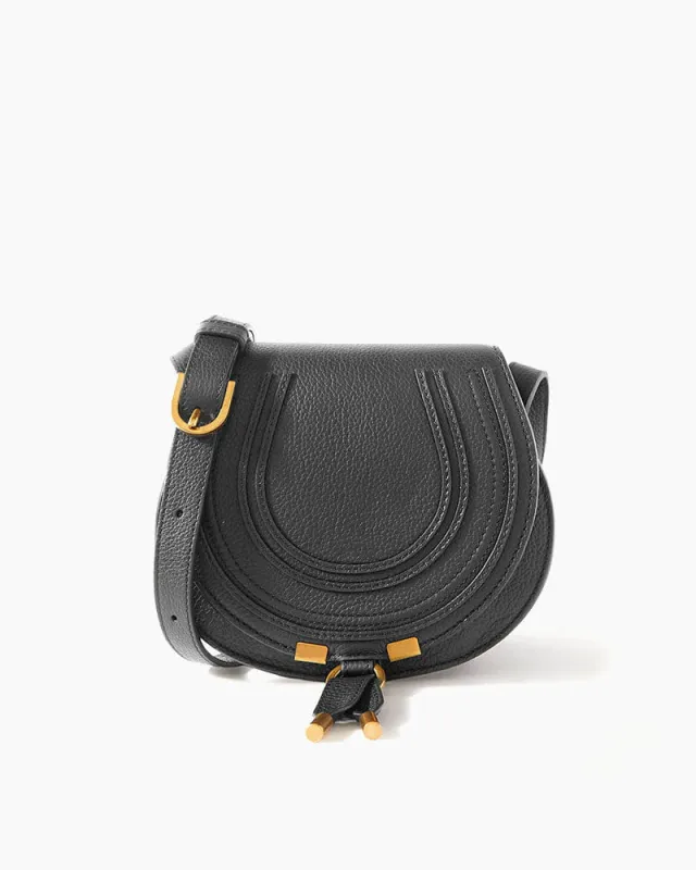 Vespera Mini Textured Leather Saddle Bag sold by Larosa