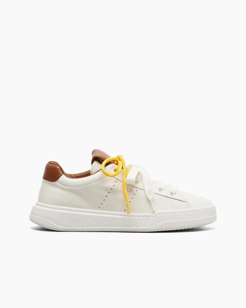 Women‘s White StrideForce Leather Sneakers sold by Larosa