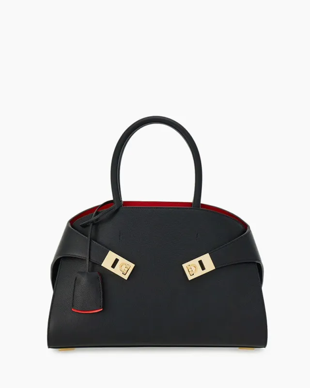 Small Hug Leather Handbag with Top Handle sold by Larosa